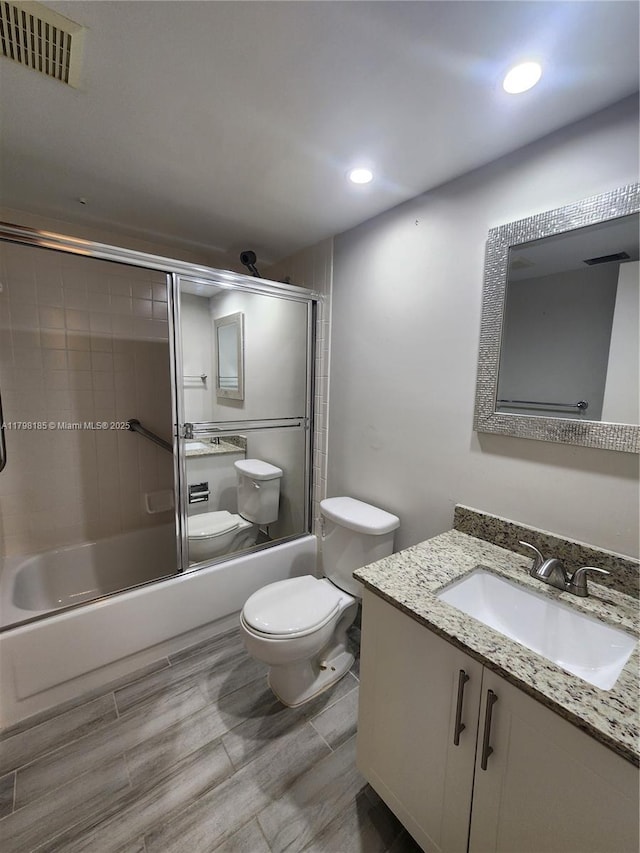 1401 SW 128th Ter Unit 305H, Pembroke Pines, FL 33027 - full bath featuring shower / bath combination with glass door, vanity, and recessed lighting