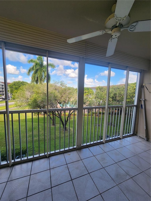 1401 SW 128th Ter Unit 305H, Pembroke Pines, FL 33027 - unfurnished sunroom featuring tile patterned flooring