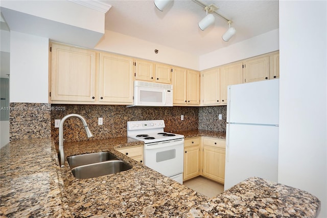 2665 SW 37th Ave Unit 1506, Miami, FL 33133 - kitchen with white appliances, dark stone countertops, decorative backsplash, and cream cabinetry