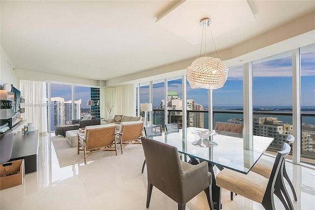 dining space with a water view