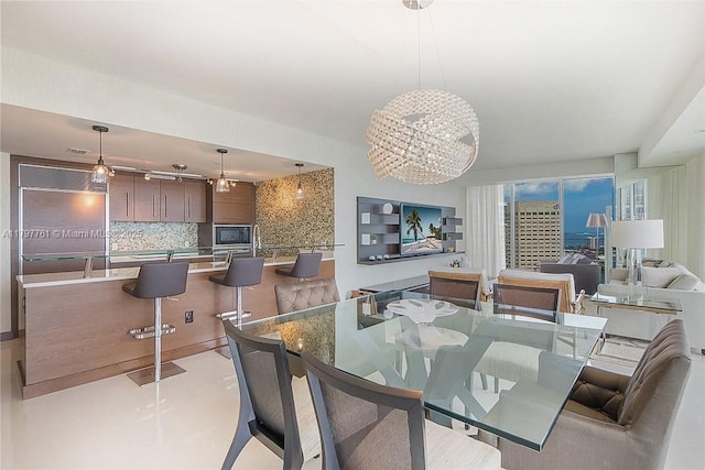 dining room with a chandelier