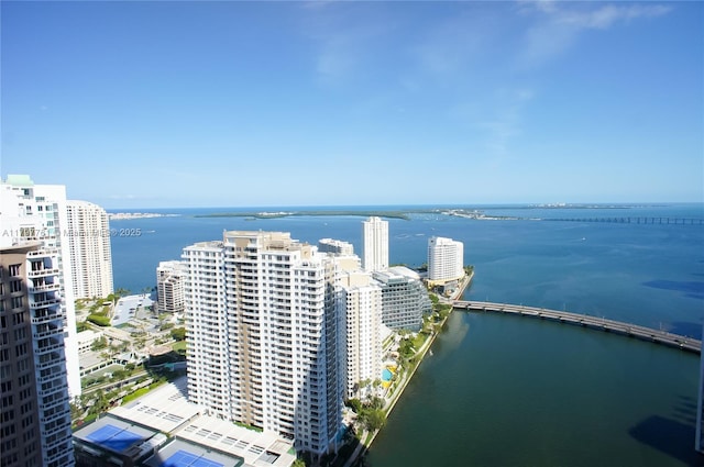 view of urban area with a nearby body of water