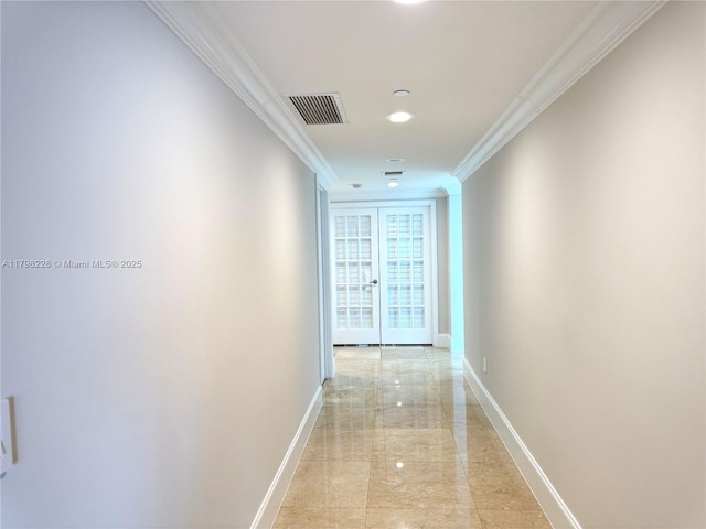 corridor with ornamental molding, baseboards, visible vents, and recessed lighting