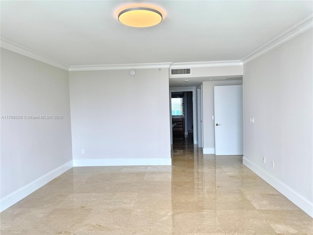 unfurnished room with crown molding, baseboards, and visible vents