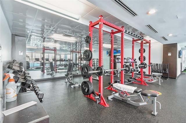 workout area with visible vents and recessed lighting