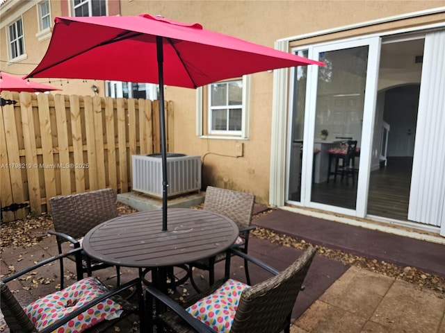 6101 NW 114th Ct Unit 124, Doral, FL 33178 - view of patio featuring central air condition unit