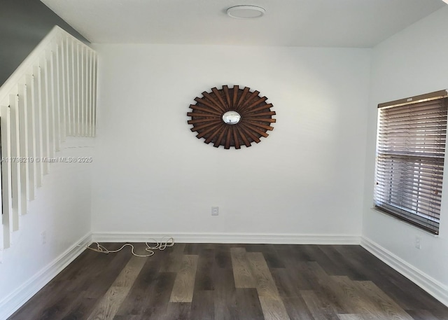 6101 NW 114th Ct Unit 124, Doral, FL 33178 - spare room with wood finished floors and baseboards