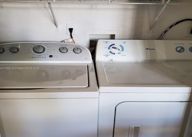 6101 NW 114th Ct Unit 124, Doral, FL 33178 - washroom with independent washer and dryer