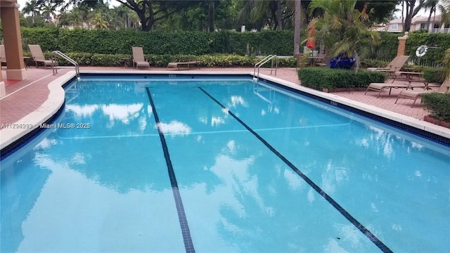 6101 NW 114th Ct Unit 124, Doral, FL 33178 - community pool with a patio