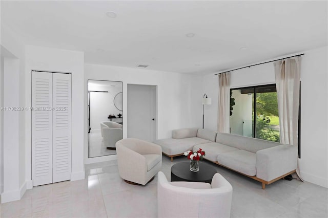 231 NE 45th St, Miami, FL 33137 - living area with baseboards, tile patterned flooring, and visible vents