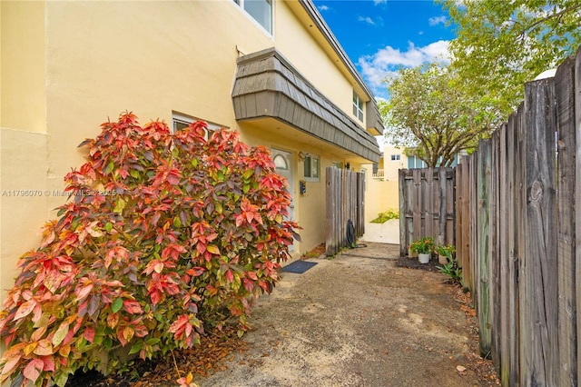 8425 SW 137th Ave Unit 8425, Miami, FL 33183 - view of side of property with stucco siding and fence