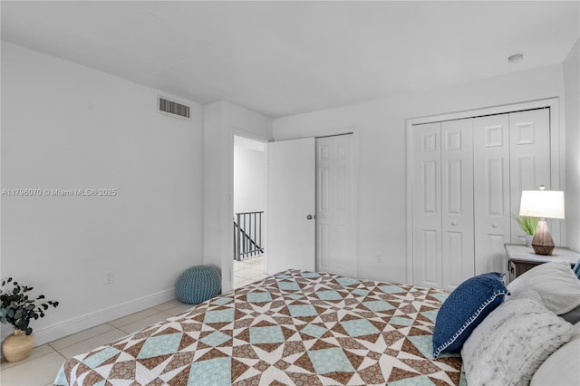 8425 SW 137th Ave Unit 8425, Miami, FL 33183 - bedroom featuring tile patterned floors, multiple closets, and baseboards