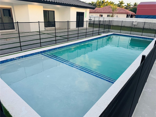 19614 SW 133rd Ct, Miami, FL 33177 - view of swimming pool featuring a patio area