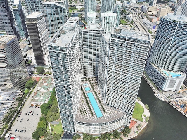 view of urban area featuring a large body of water