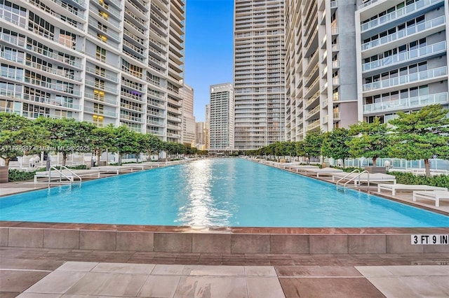 community pool featuring a view of city
