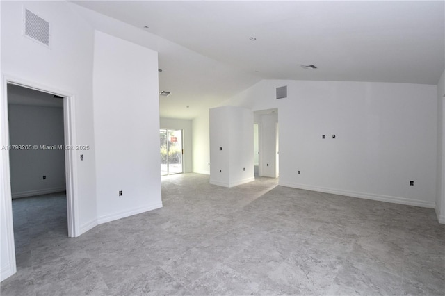 4463 60th Ave NE, Naples, FL 34120 - empty room featuring vaulted ceiling and baseboards