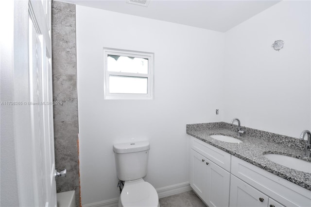 4463 60th Ave NE, Naples, FL 34120 - bathroom featuring double vanity and toilet