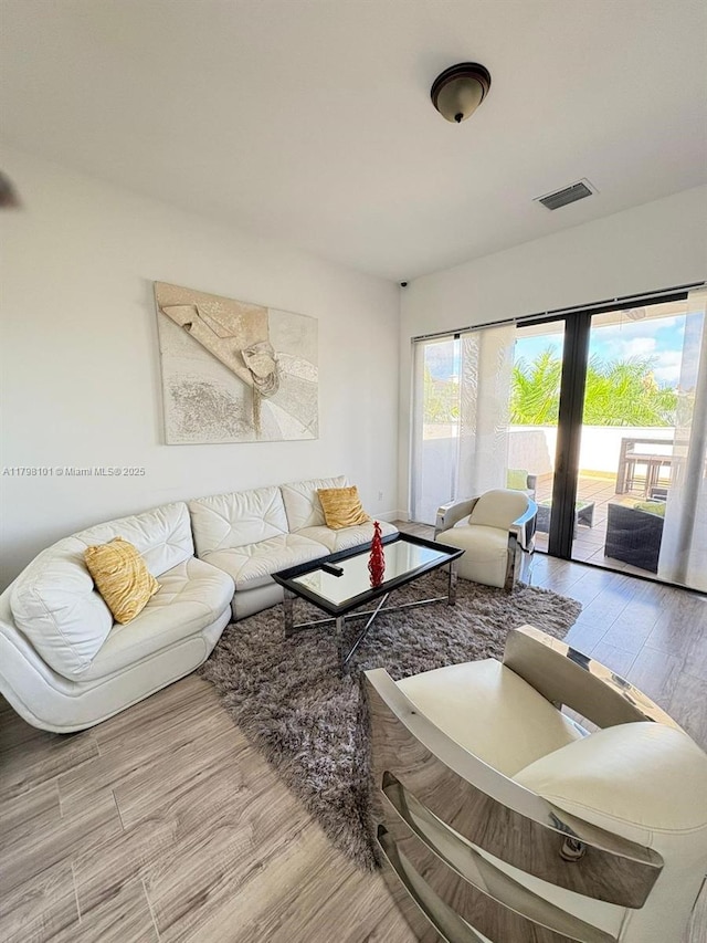 living room with wood finished floors