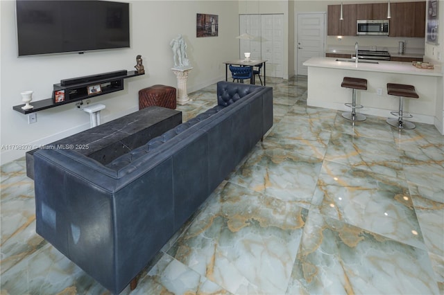 4962 NW 83rd Path Unit 4962, Doral, FL 33166 - living area featuring light marble finish flooring