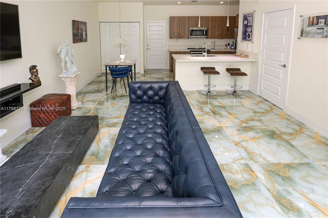 4962 NW 83rd Path Unit 4962, Doral, FL 33166 - living room featuring light marble finish floors, baseboards, and recessed lighting