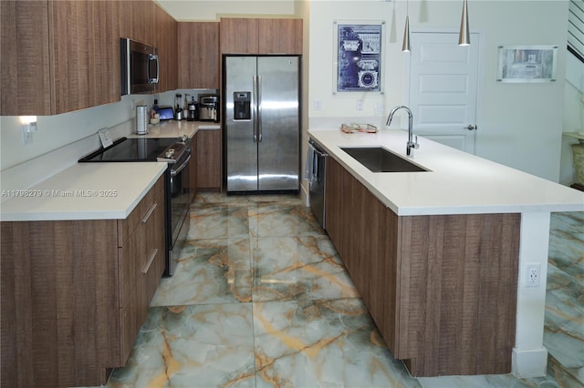 4962 NW 83rd Path Unit 4962, Doral, FL 33166 - kitchen with stainless steel appliances, a sink, modern cabinets, light marble finish floors, and light countertops