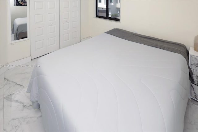 4962 NW 83rd Path Unit 4962, Doral, FL 33166 - bedroom featuring marble finish flooring and a closet