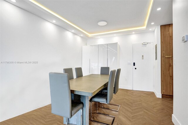 1980 S Ocean Dr Unit 19H, Hallandale Beach, FL 33009 - dining room with recessed lighting, a raised ceiling, and baseboards