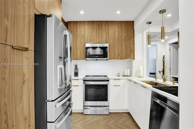 1980 S Ocean Dr Unit 19H, Hallandale Beach, FL 33009 - kitchen with stainless steel appliances, modern cabinets, pendant lighting, light countertops, and recessed lighting