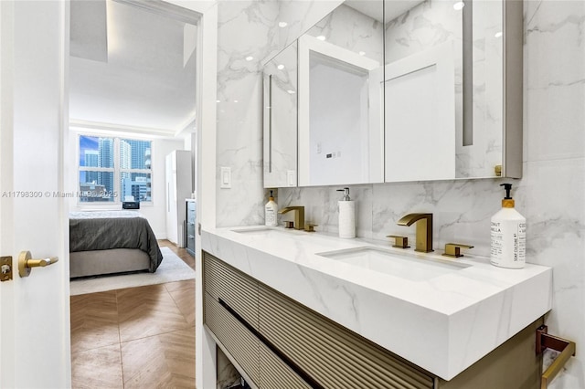 1980 S Ocean Dr Unit 19H, Hallandale Beach, FL 33009 - ensuite bathroom with tasteful backsplash and double vanity
