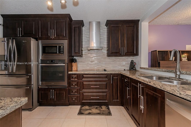 11733 NW 11th St, Pembroke Pines, FL 33026 - kitchen with appliances with stainless steel finishes, wall chimney exhaust hood, a sink, light stone countertops, and a textured ceiling