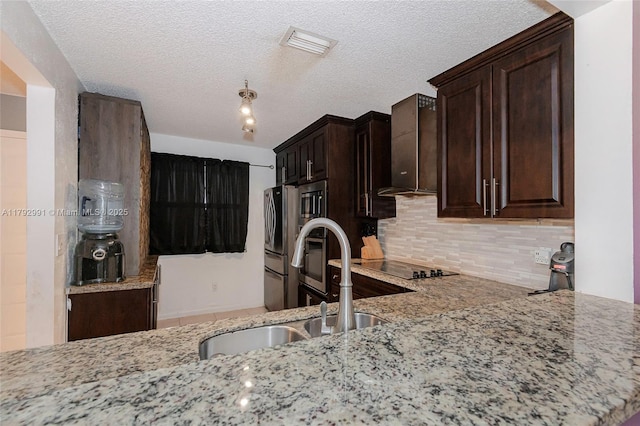 11733 NW 11th St, Pembroke Pines, FL 33026 - kitchen featuring wall chimney exhaust hood, light stone counters, backsplash, dark brown cabinets, and a sink
