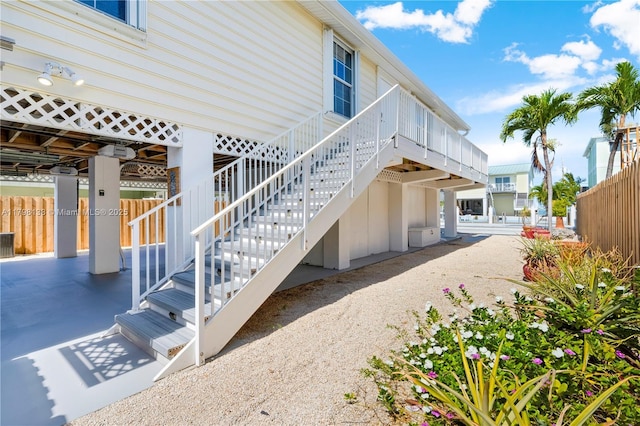 back of property with fence