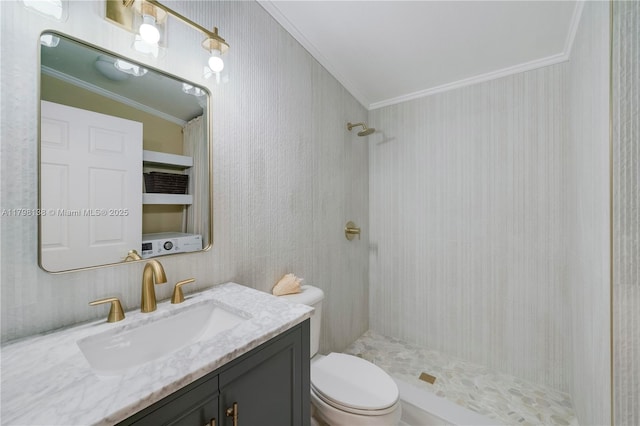 bathroom with ornamental molding, toilet, a shower, and vanity