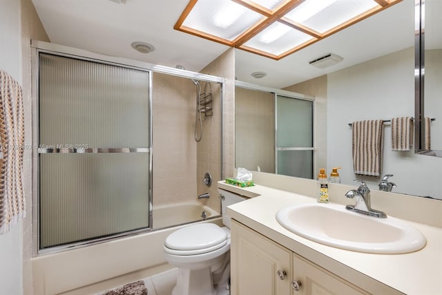 6392 Aspen Glen Cir Unit 1, Boynton Beach, FL 33437 - bathroom with toilet, vanity, and enclosed tub / shower combo