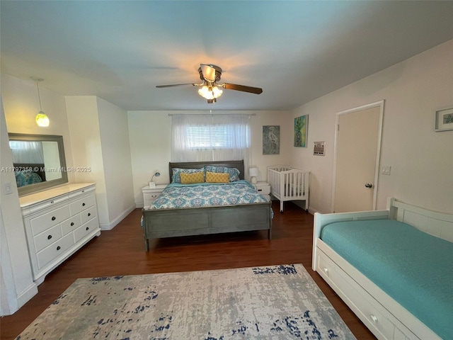 4410 N Buchanan St, Hollywood, FL 33021 - bedroom featuring dark wood-style flooring, a ceiling fan, and baseboards