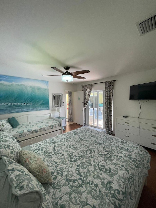 4410 N Buchanan St, Hollywood, FL 33021 - bedroom with access to exterior, dark wood-style floors, and a ceiling fan