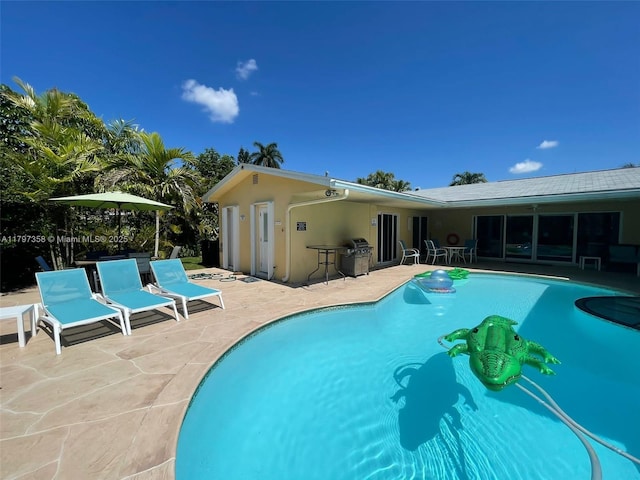 4410 N Buchanan St, Hollywood, FL 33021 - swimming pool with a patio and a grill