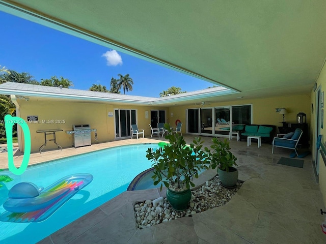 4410 N Buchanan St, Hollywood, FL 33021 - swimming pool with a patio area, a grill, and outdoor lounge area