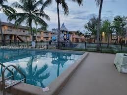 101 NE 41st St Unit E73, Oakland Park, FL 33334 - community pool with fence