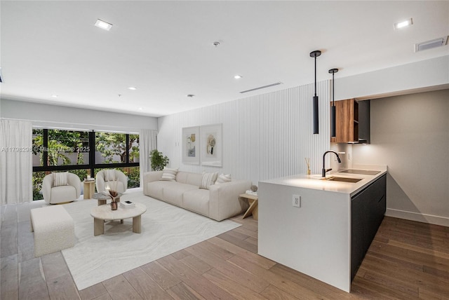 204 Sunrise Dr Unit 204D, Key Biscayne, FL 33149 - living area featuring wood finished floors, recessed lighting, and bar area