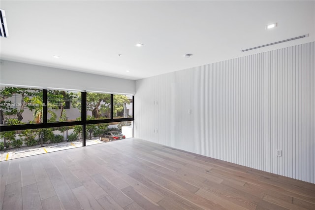 204 Sunrise Dr Unit 204D, Key Biscayne, FL 33149 - unfurnished room featuring wood finished floors and recessed lighting