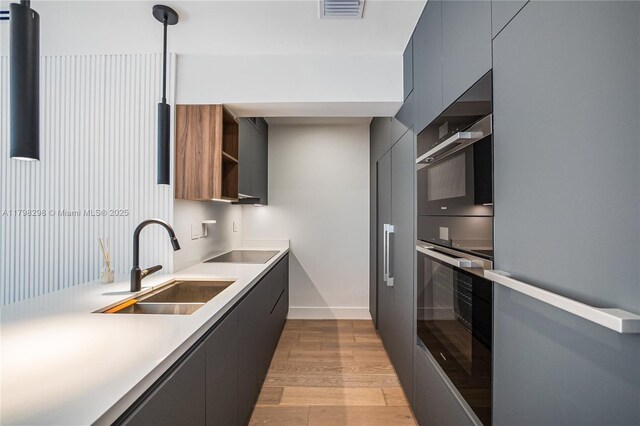 204 Sunrise Dr Unit 204D, Key Biscayne, FL 33149 - kitchen with open shelves, freestanding refrigerator, modern cabinets, a sink, and black electric cooktop