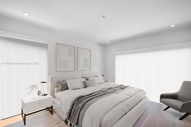 204 Sunrise Dr Unit 204D, Key Biscayne, FL 33149 - bedroom with light wood-style floors