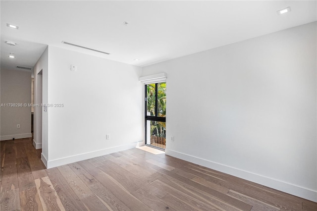 204 Sunrise Dr Unit 204D, Key Biscayne, FL 33149 - unfurnished room with wood finished floors and baseboards