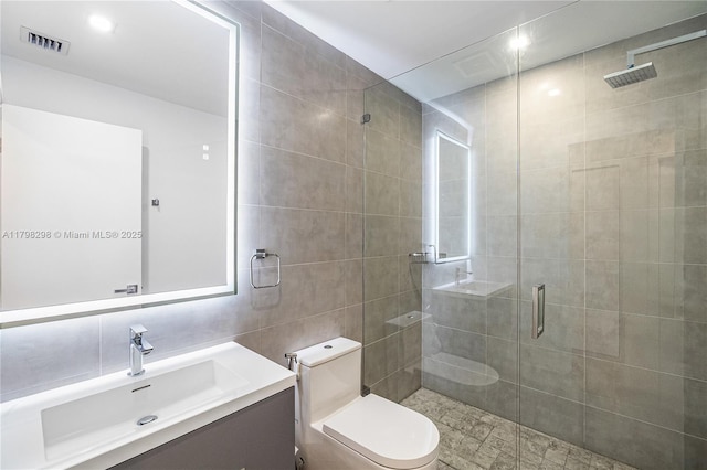 204 Sunrise Dr Unit 204D, Key Biscayne, FL 33149 - full bathroom featuring a shower stall, vanity, and toilet