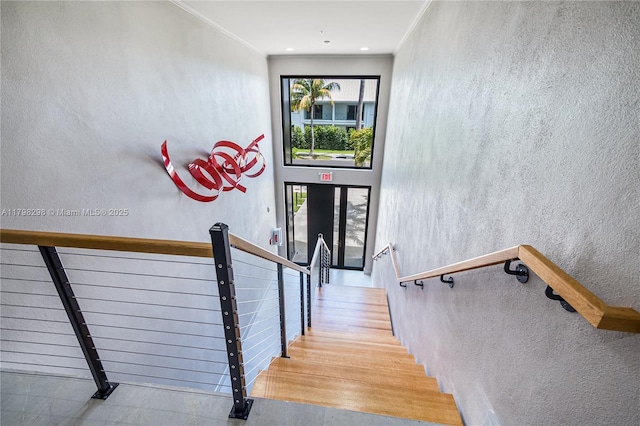 204 Sunrise Dr Unit 204D, Key Biscayne, FL 33149 - staircase featuring ornamental molding