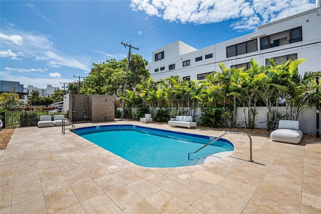 204 Sunrise Dr Unit 204D, Key Biscayne, FL 33149 - community pool featuring a patio