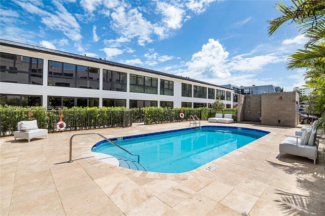 204 Sunrise Dr Unit 204D, Key Biscayne, FL 33149 - community pool with a patio