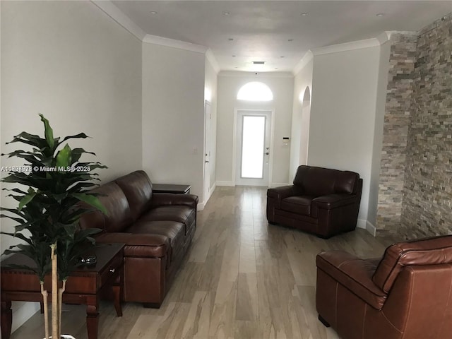 1010 NE 36th Ave, Homestead, FL 33033 - living room with light wood-style floors, crown molding, and baseboards