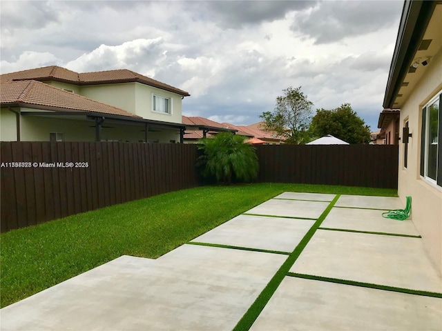 1010 NE 36th Ave, Homestead, FL 33033 - view of yard with a patio